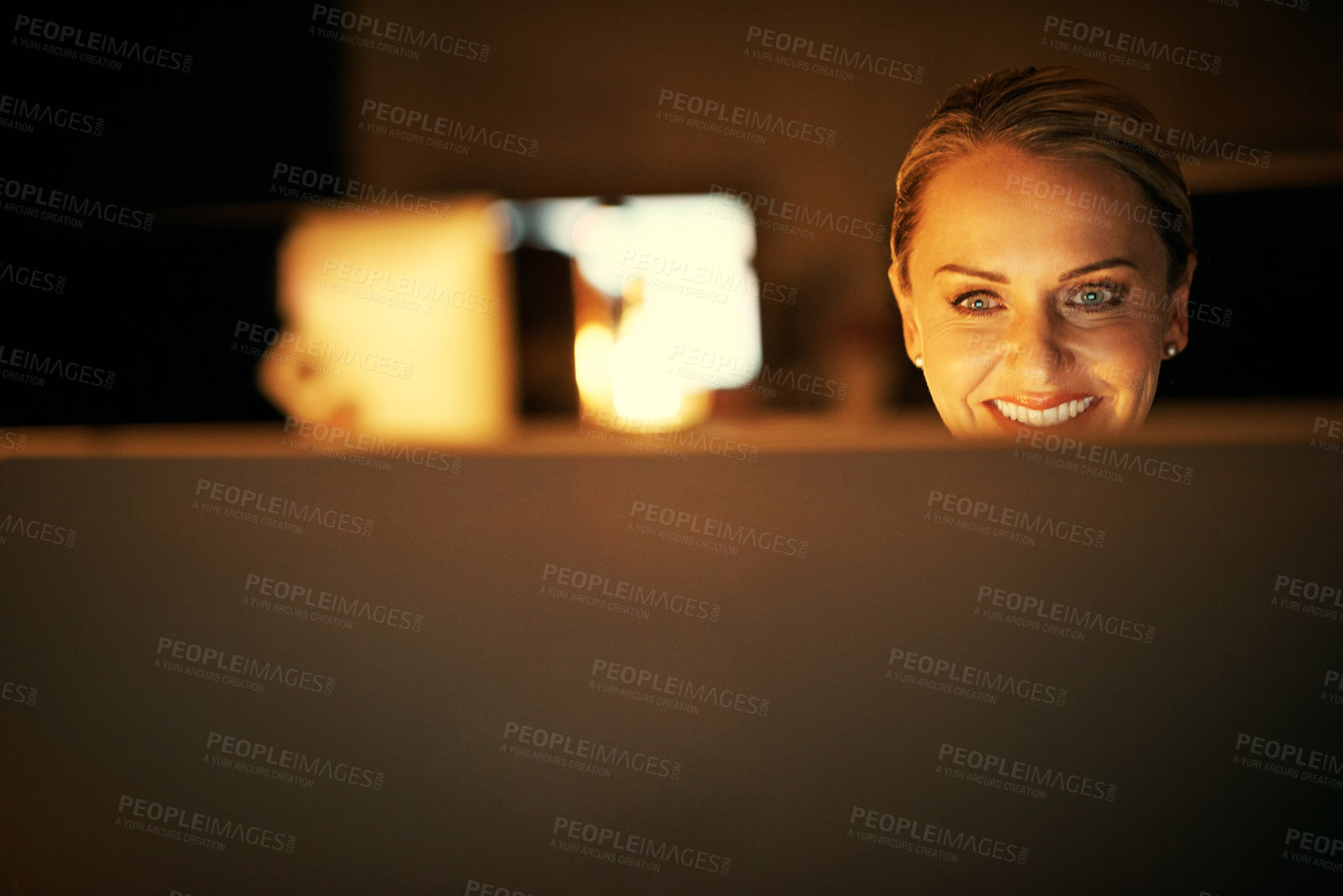 Buy stock photo Night, woman and smile in office with computer, news report deadline and submission for online story. Late, space and mature person in workplace with pc, research and complete article for website.