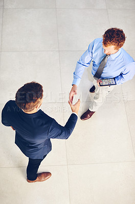 Buy stock photo Businessman, handshake and meeting with partnership for deal, agreement or b2b together above at office. Top view of employee or colleagues shaking hands for teamwork, unity or thank you at workplace