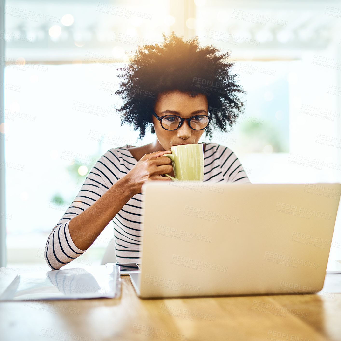 Buy stock photo Drink, laptop and black woman for remote work, coffee and copywriting on desk, documents and paperwork. Morning, employee and person with computer, typing and research for website of blog in home