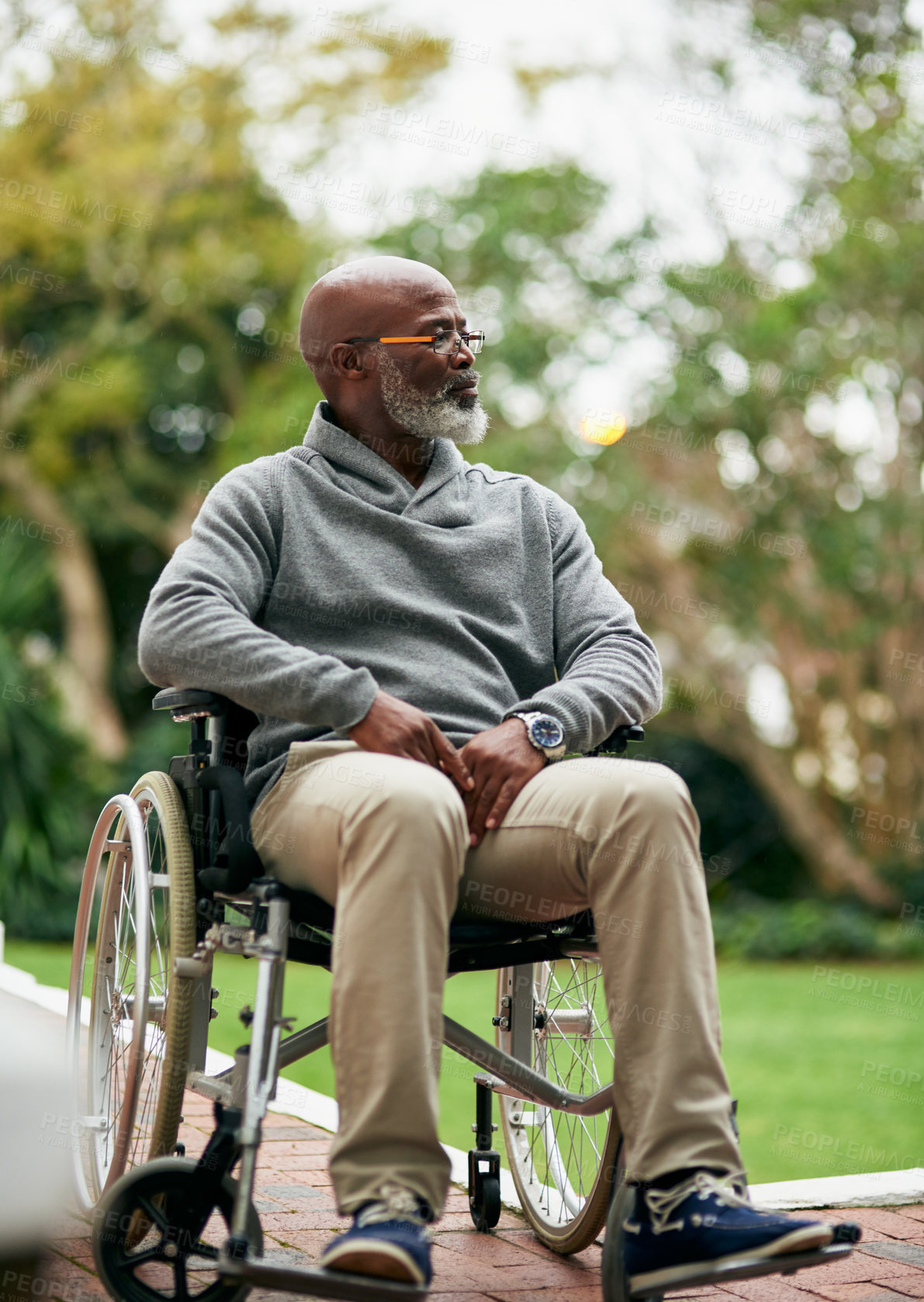 Buy stock photo Ideas, nature and elderly man in wheelchair with memory, remember or reflection in outdoor park. Planning, thinking and senior African male person with disability in retirement in garden or field.