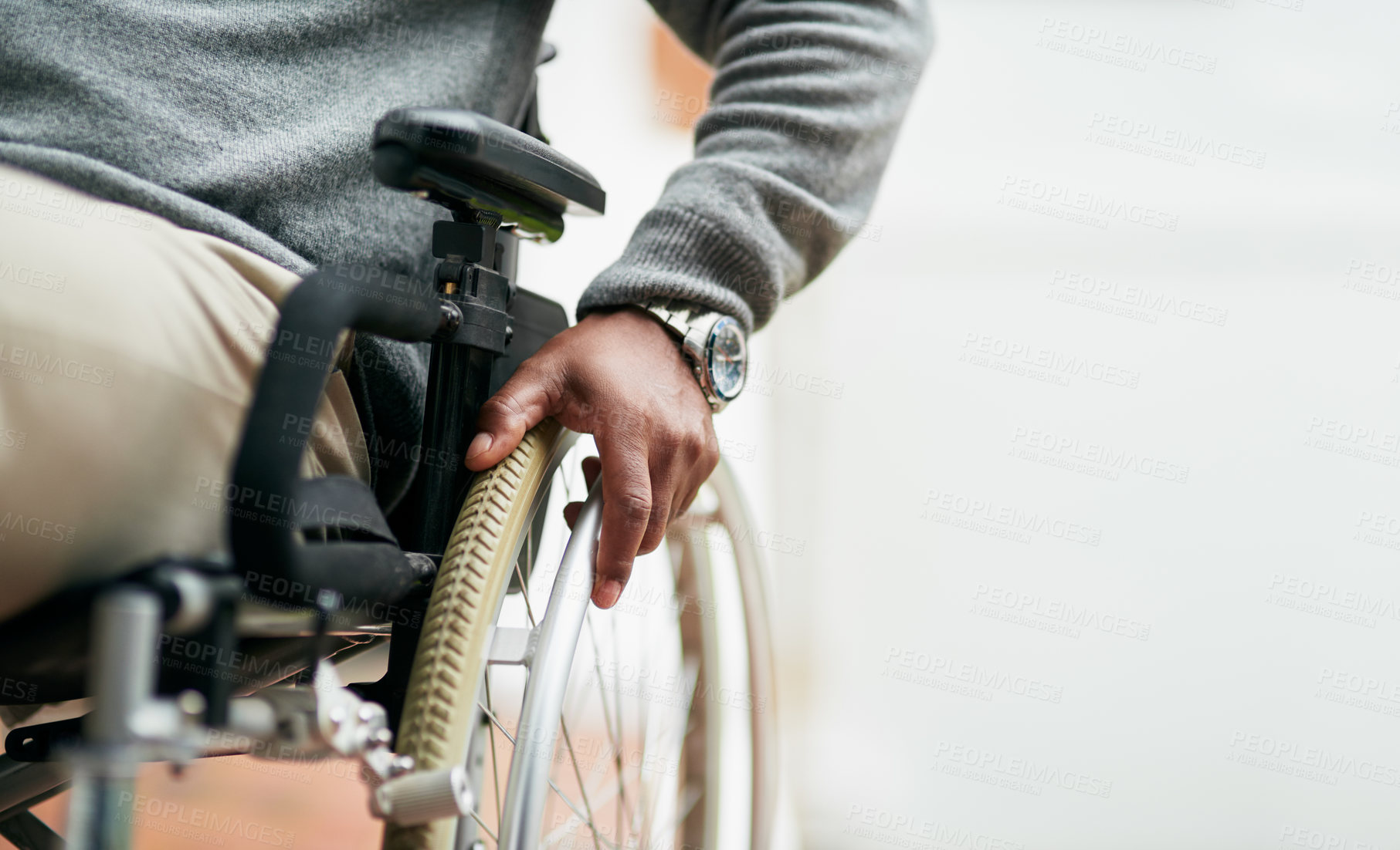 Buy stock photo Cropped shot of an unrecognizable senior man sitting in his wheelchair at home