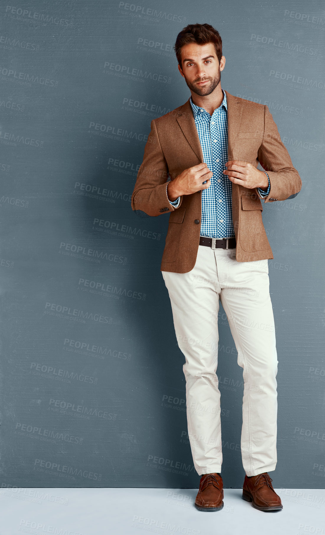 Buy stock photo Relax, style and portrait of man with confidence, creative career and professional in studio. Business, trendy fashion and businessman on grey background with pride, opportunity and designer clothes