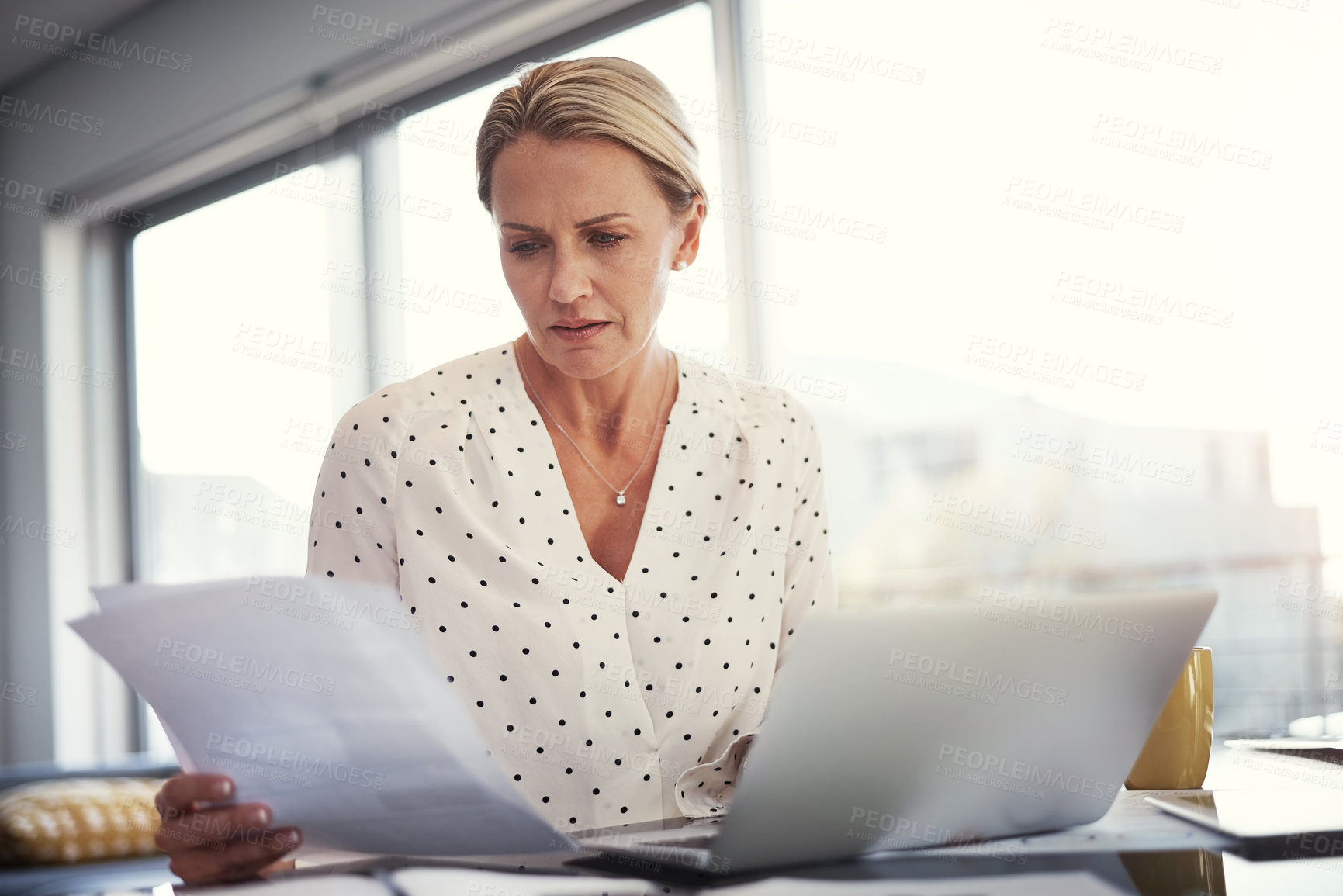 Buy stock photo Laptop, woman or worry with documents in home for invoice review, compare client data or remote work. Freelance accountant, mature person and tech with concern for receipts and cash flow verification