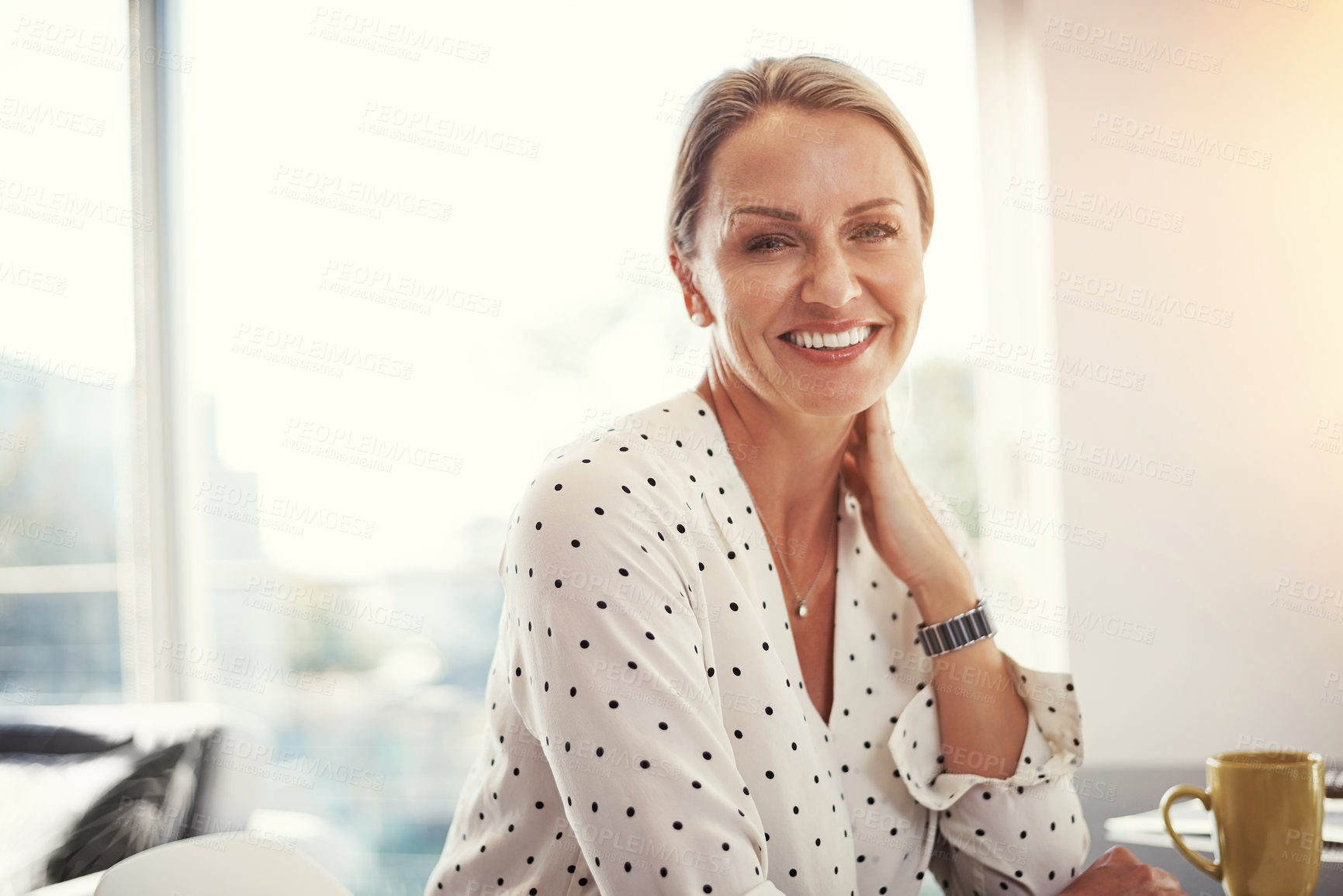 Buy stock photo Cropped shot of a mature businesswoman working from her home office