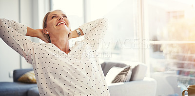 Buy stock photo Cropped shot of a mature businesswoman working from her home office