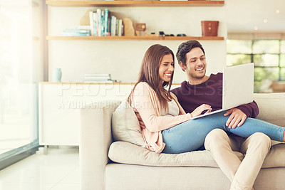Buy stock photo Laptop, happy and couple on sofa in living room browsing for movie, show or film together at home. Smile, love and people relax and streaming funny, comic or comedy video on computer or technology
