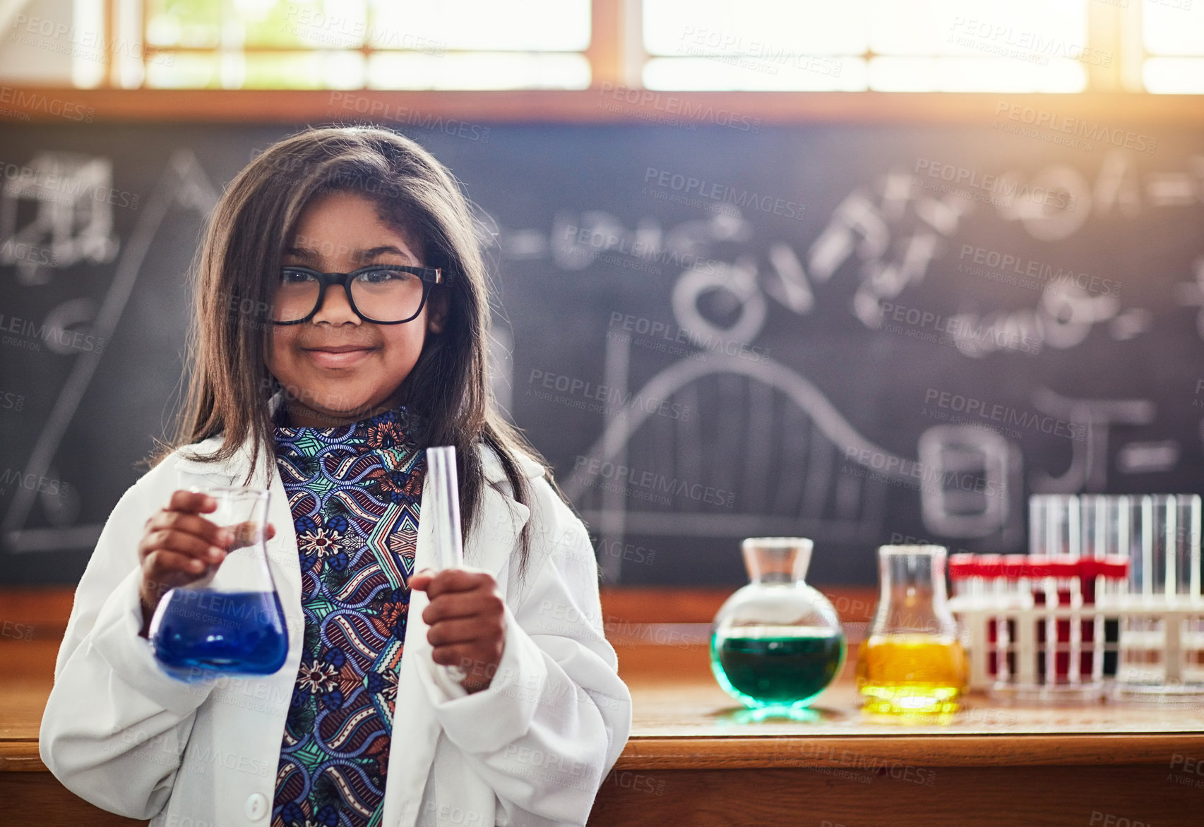 Buy stock photo Cropped shot of a cute little girl in a science lab