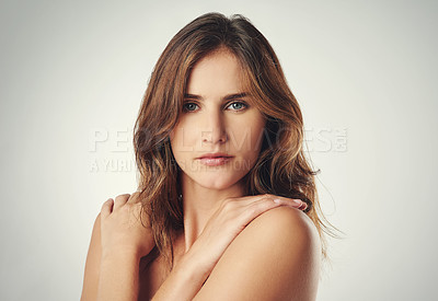 Buy stock photo Hug, self love and portrait of woman for skincare, beauty and dermatology with confidence isolated on gray background. Hand, skin and model natural with glow, wellness and soft on studio backdrop