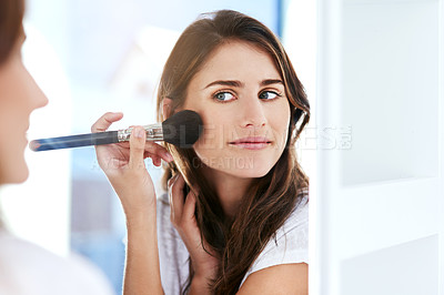 Buy stock photo Mirror, makeup brush and face of woman with cosmetic facial routine for skin glow at home. Smile, confident and female person with beauty tool for cosmetology treatment in reflection at apartment.