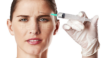 Buy stock photo Woman, face and syringe in hand with glove for dermatology, skincare and beauty treatment for anti age, botox or facial. Young person, frown and portrait for plastic surgery or medical aesthetic  