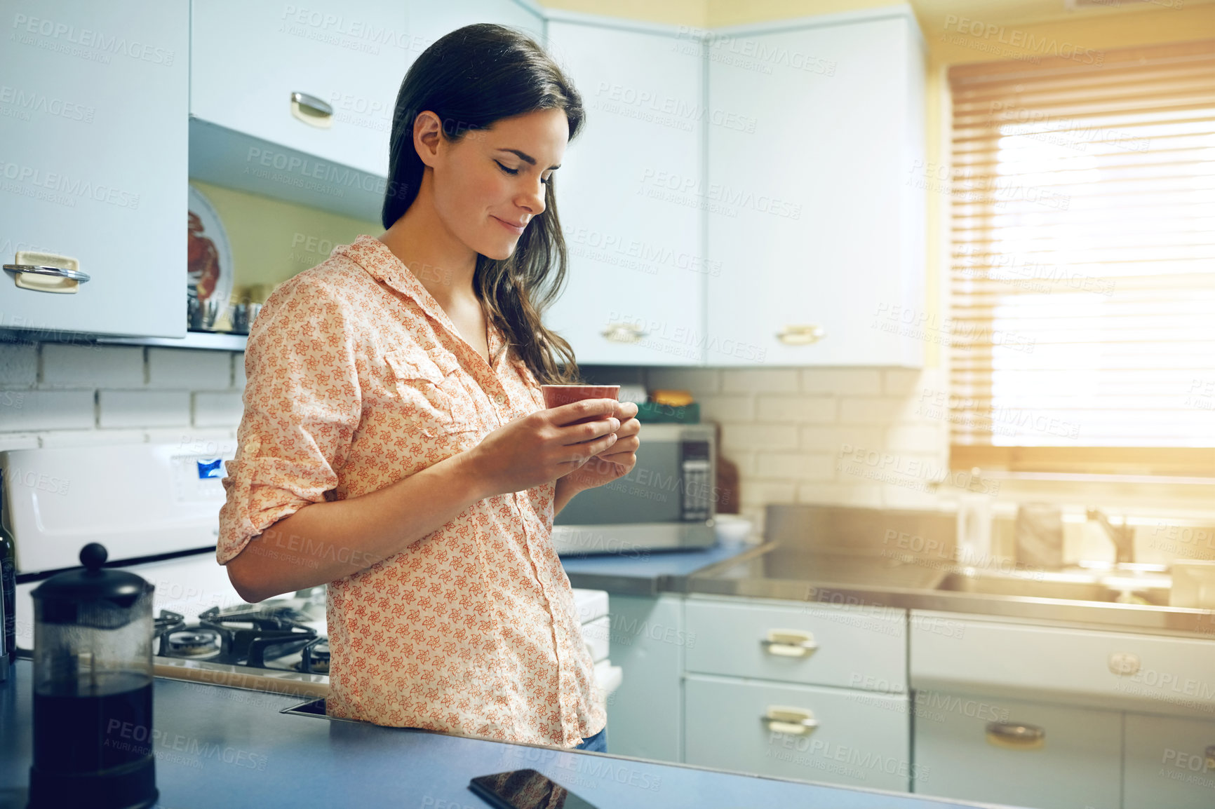 Buy stock photo Woman, smile and thinking with coffee in kitchen for reflection, memory and nostalgia in morning at home. Person, happy and perspective with warm drink, beverage or cup with daydream at apartment