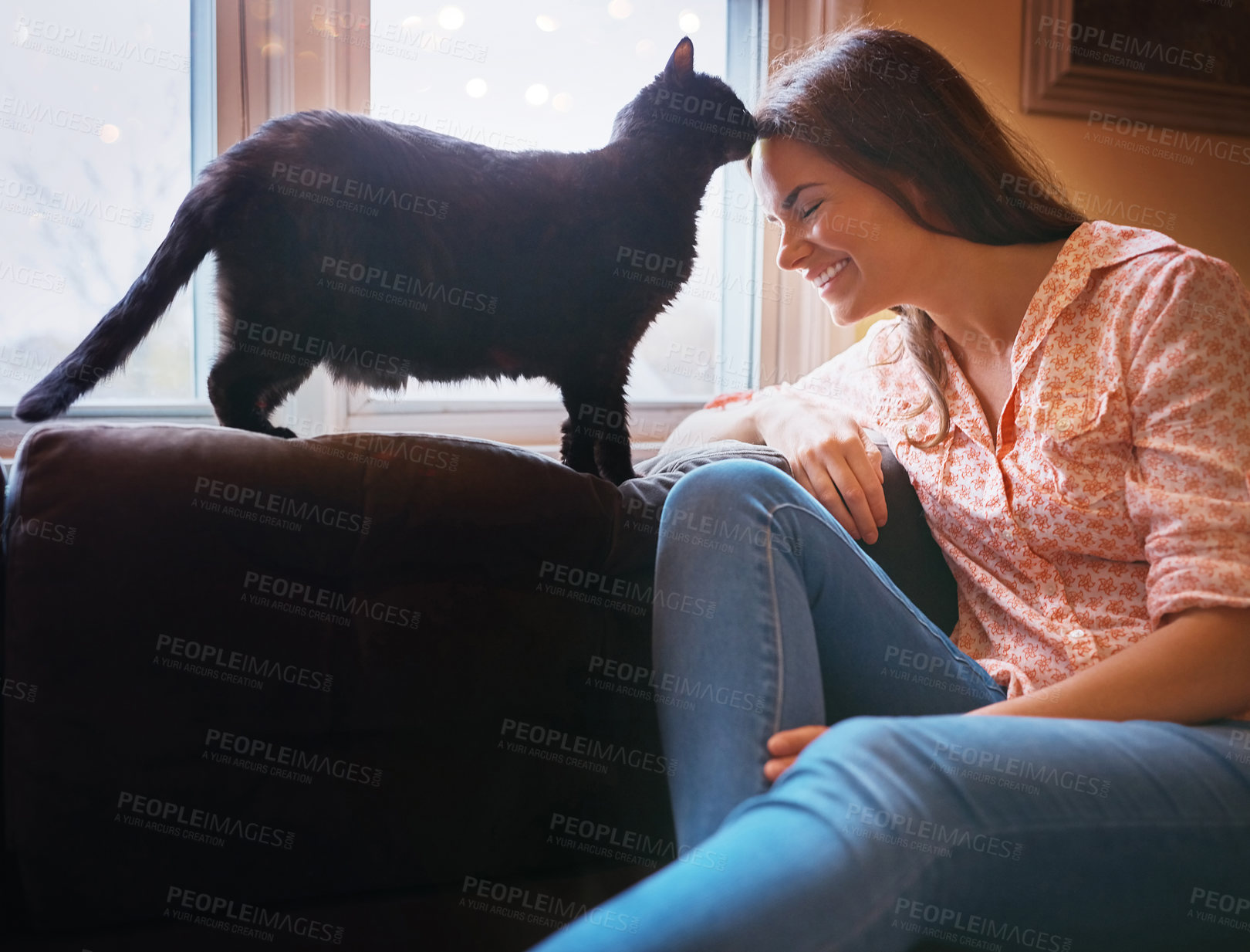 Buy stock photo Woman, relax and cat kiss in home for love, scratch and domestic animal for companion or loyalty. Female person, pet care and peace in living room or forehead touch for affection, sofa and support
