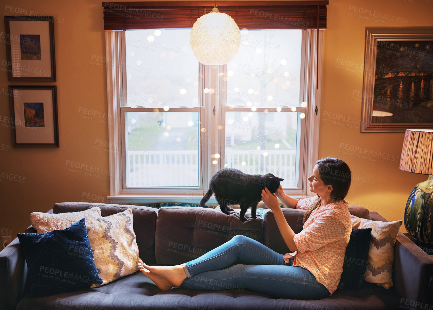 Buy stock photo Love, cat and woman on sofa at house with animal bonding, care and relax or fluffy friend for petting massage. Smile, female owner and kitten pet with stroke, hug and affection in living room