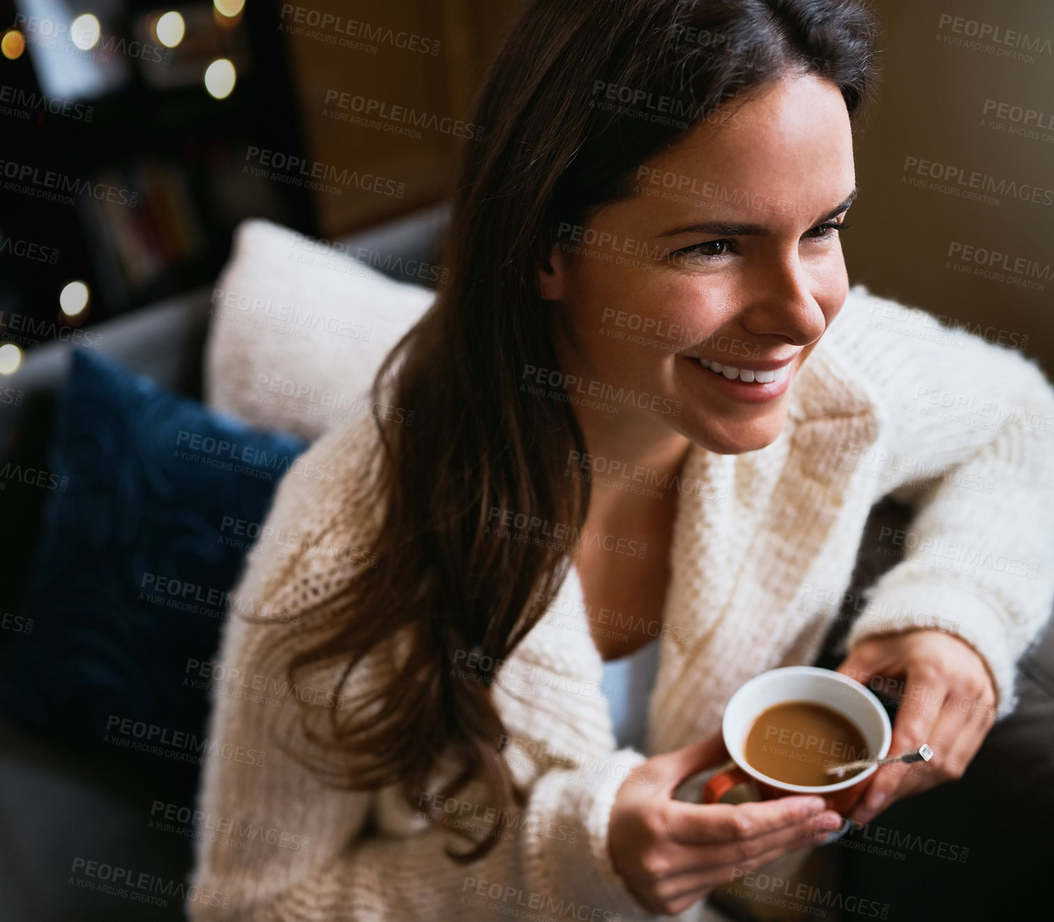 Buy stock photo Woman, happy and relax with coffee cup in living room for morning, apartment and thinking on sofa. Smile, top view and calm female person with warm beverage for self care, weekend or peace at home