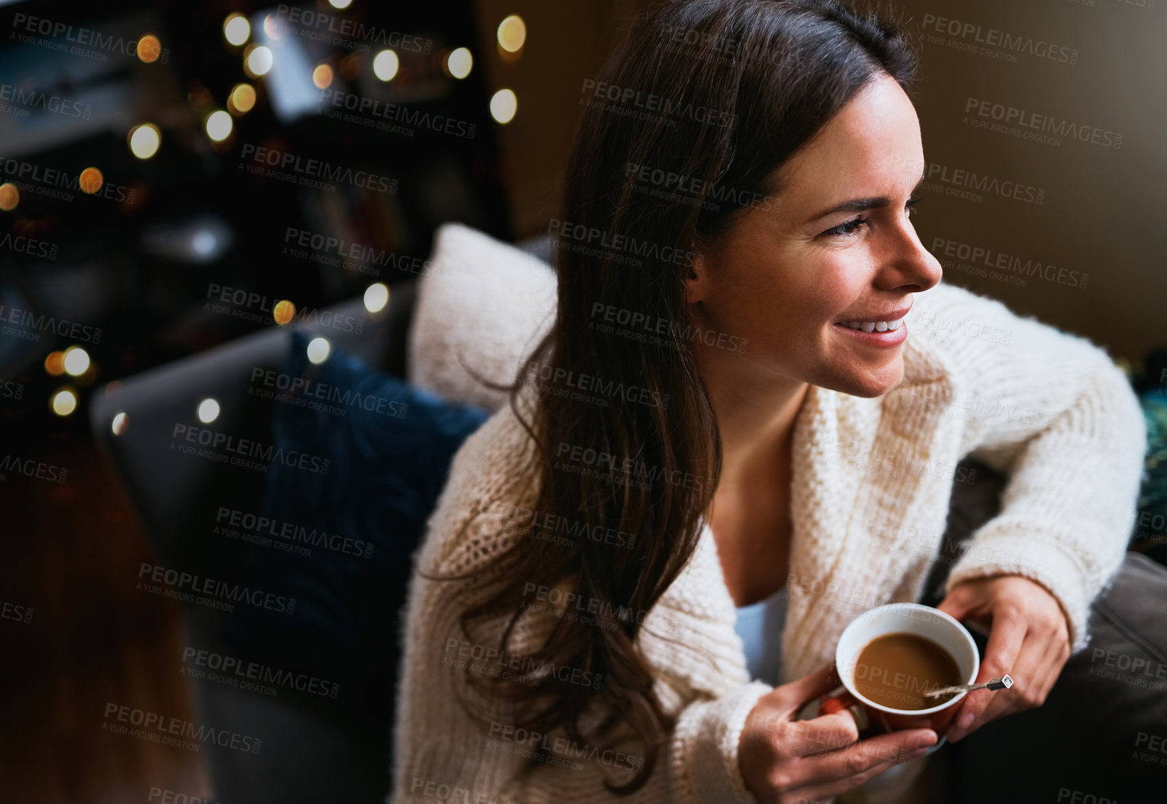 Buy stock photo Woman, happy and relax with coffee in living room for weekend, morning and thinking on sofa. Smile, top view and calm female person with warm beverage for self care, peace and satisfaction at home