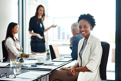 Buy stock photo Happy assistant or intern looking cheerful in a team planning meeting at work. Portrait of a proud employee with colleagues as they discuss new innovative plans and strategy in a corporate office

