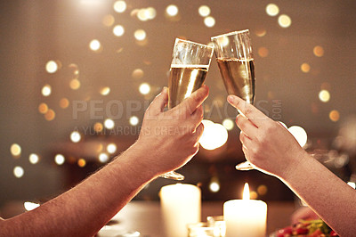 Buy stock photo Cheers, toast and celebration for a couple on romantic date night celebrating an anniversary, valentines or a birthday. Closeup of hands holding glasses of champagne, alcohol and booze in restaurant