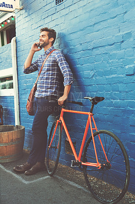 Buy stock photo Outdoor, phone call and man with bicycle, urban professional in creative conversation and travel in city. Relax, smartphone and freelancer on sidewalk with bike, morning commute and happy discussion