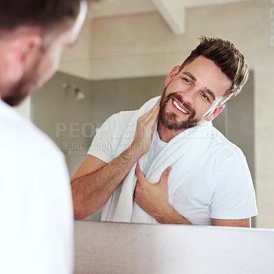 Buy stock photo Grooming, face and mirror for man with skincare and self care routine in a bathroom with a smile. Home, reflection and cleaning with a young male person feeling happy from beard growth or dermatology