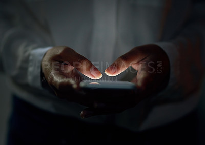 Buy stock photo Cropped shot of an unrecognizable woman using a cellphone