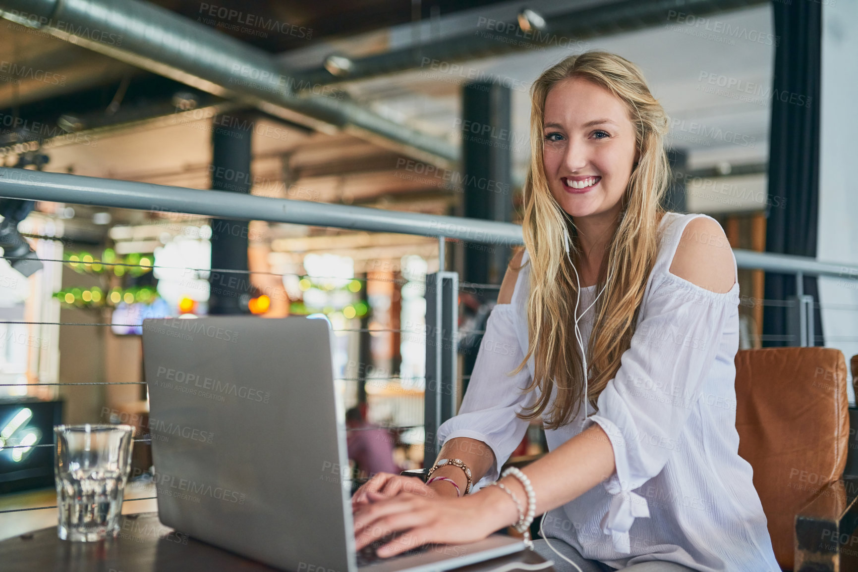 Buy stock photo Happy woman, portrait and journalist with laptop at cafe for online browsing, content creation or digital writing. Young, female person or author with smile on computer for connection at coffee shop