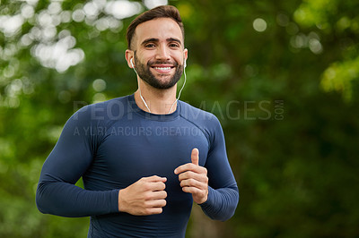 Buy stock photo Portrait, fitness and man in nature with earphones for listening to music, podcast or radio. Sports, workout and male athlete with audio tech for streaming cardio playlist for running at outdoor park