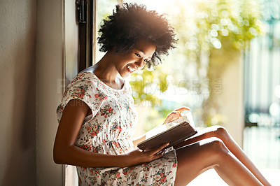 Buy stock photo Woman, reading and book in home or relax, door way and sitting on floor for comfort with literature or novel for hobby. Fiction, fantasy and knowledge or information on weekend, apartment and happy 