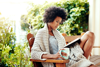 Buy stock photo Black woman, read and coffee for outside in nature, book and backyard or garden for relax. Patio, bench and tea cup for calm and break in home for female person, morning or outdoors in house backyard
