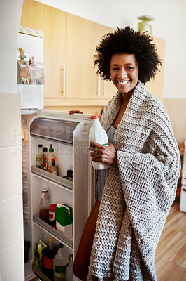 Buy stock photo Black woman, smile and portrait in kitchen with milk for breakfast, lazy morning and weekend break. Female person, happy and fridge open with ingredients for cooking, eating and snack or comfort food