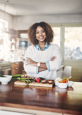 Buy stock photo Wellness, cooking and a healthy lifestyle at home with a happy woman starting a weight loss journey. Portrait of a female smiling preparing a nutritious meal with organic vegetables in a kitchen