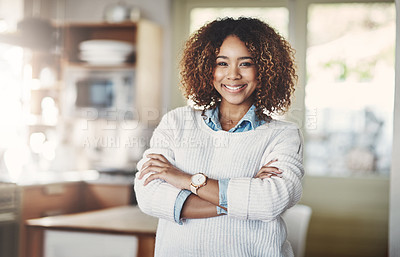 Buy stock photo Confident, happy and successful real estate agent standing with arms crossed after staging new property, house and home for sale. Portrait of smiling, proud or ambitious woman with afro ready to sell