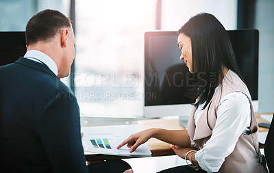 Buy stock photo Employees, document and talking together by office desk with explain for help, collaboration and colleagues. Woman, man and teamwork for discussion in creative agency with computer and company report