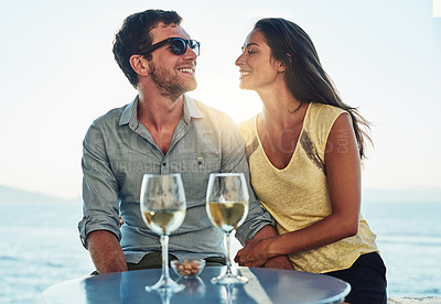 Buy stock photo Cropped shot of a happy couple out on a romantic date