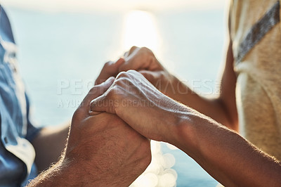 Buy stock photo Cropped shot of an unrecognizable couple holding hand