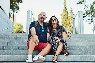 Buy stock photo Shot of an affectionate couple spending time together outdoors