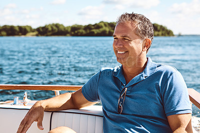 Buy stock photo Mature man, boat and vacation with thinking for retirement, smile on water cruise for future plan. Male person, yacht or thoughtful for pension goal on summer holiday, happy trip on ocean in Bali