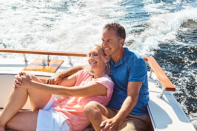 Buy stock photo Boat, outdoor or relax with mature couple at sea together for holiday, getaway or vacation for anniversary. Love, smile or romance with happy man and woman on yacht for bonding, travel or voyage