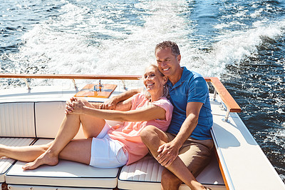 Buy stock photo Boat, cruise or luxury with mature couple at sea together for holiday, getaway or vacation for anniversary. Smile, travel or yacht with happy man and woman on water for love, romance or voyage