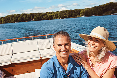 Buy stock photo Boat, happy and travel with mature couple at sea together for holiday, getaway or vacation for anniversary. Cruise, love or yacht with man and woman on water for bonding, romance or voyage date