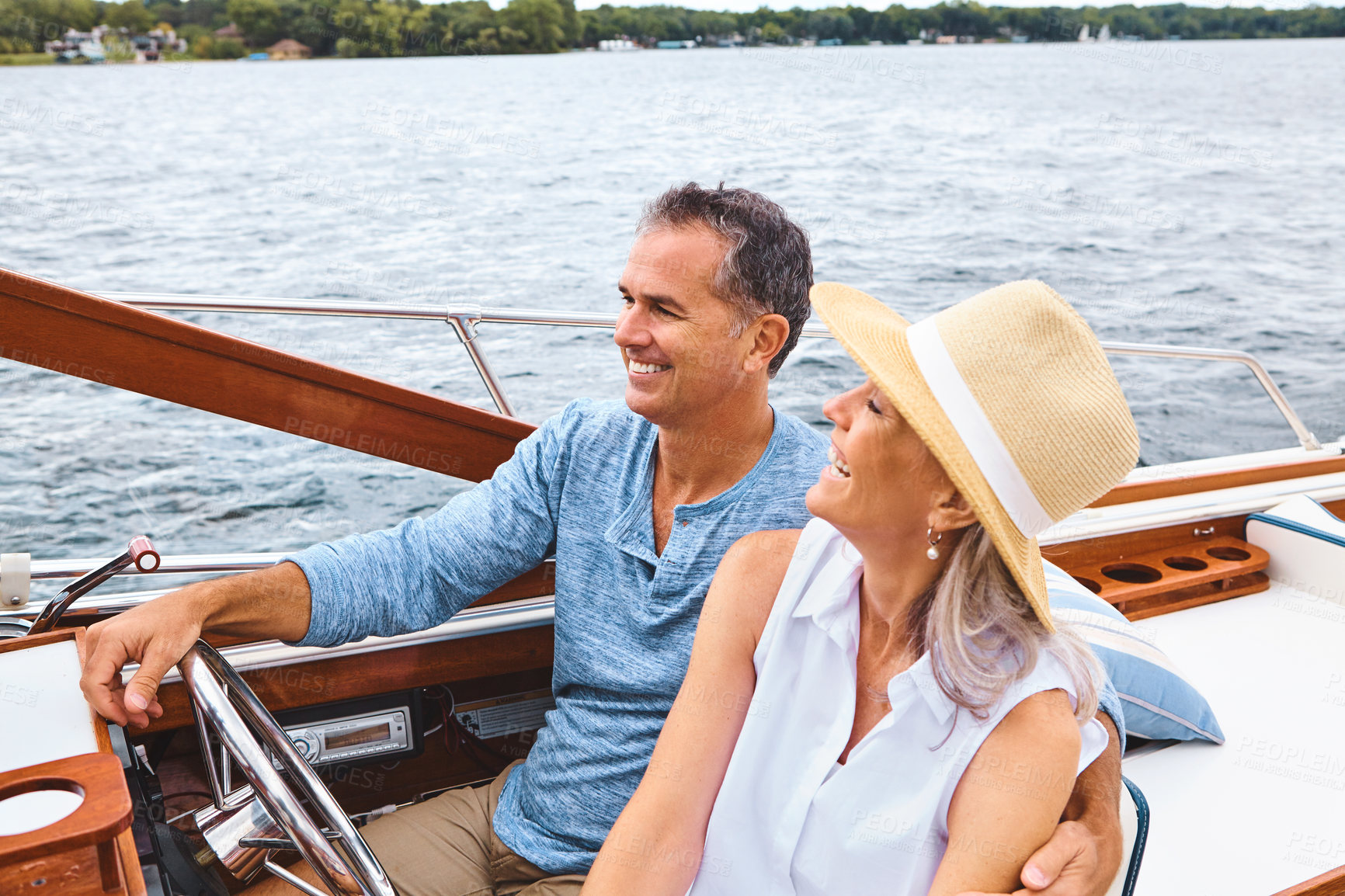 Buy stock photo Happy couple, ocean adventure and together in yacht on holiday, relax on cruise date for retirement travel. Mature, woman and man driving on lake for boat vacation with happiness, summer in Bali