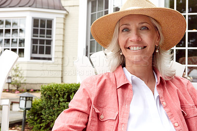 Buy stock photo Shot of a senior woman spending her day outside 