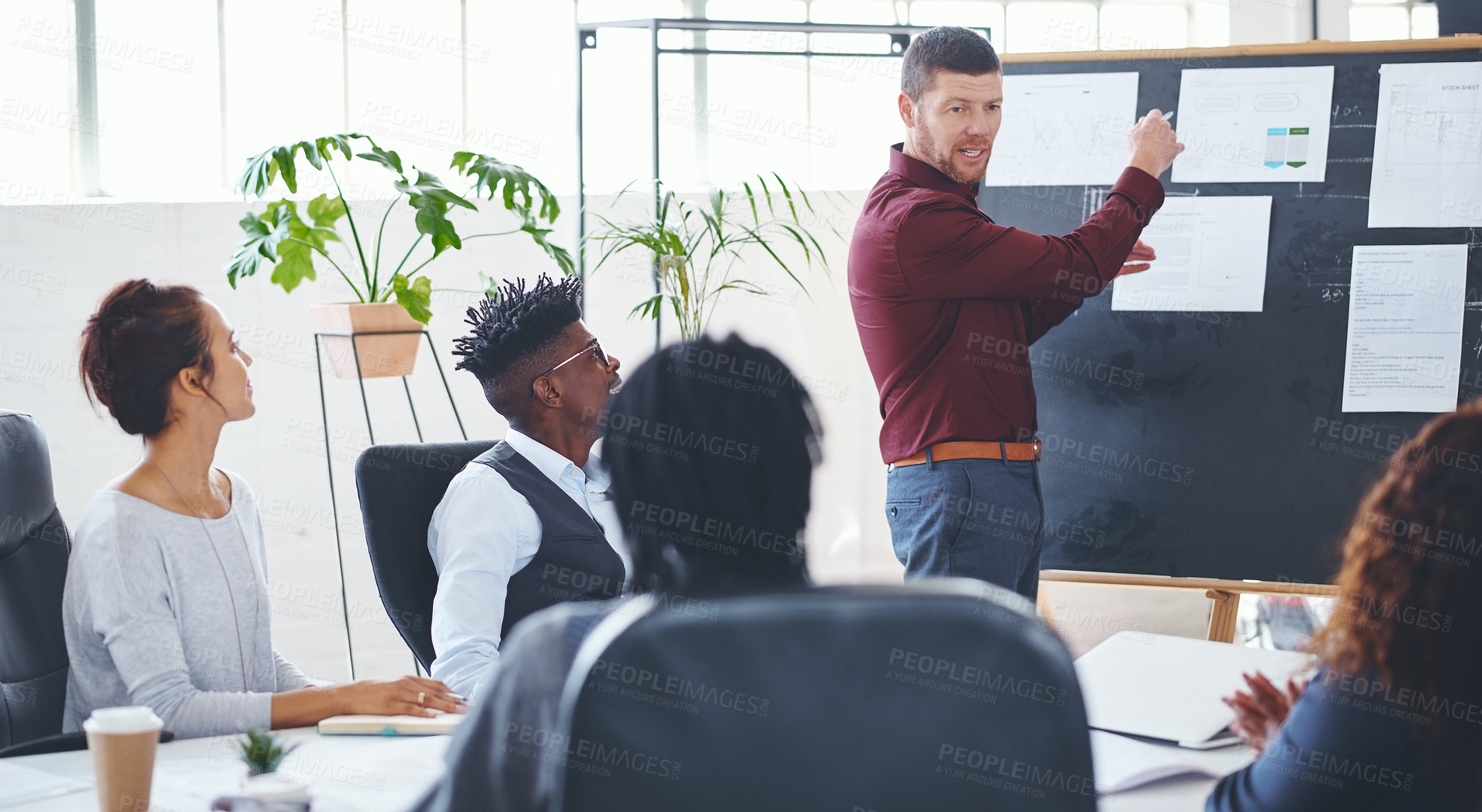 Buy stock photo Man, presentation and staff with document in office for creative startup, planning and venture. Speaker, talk and team with board for briefing, business ideas and brainstorming for marketing strategy