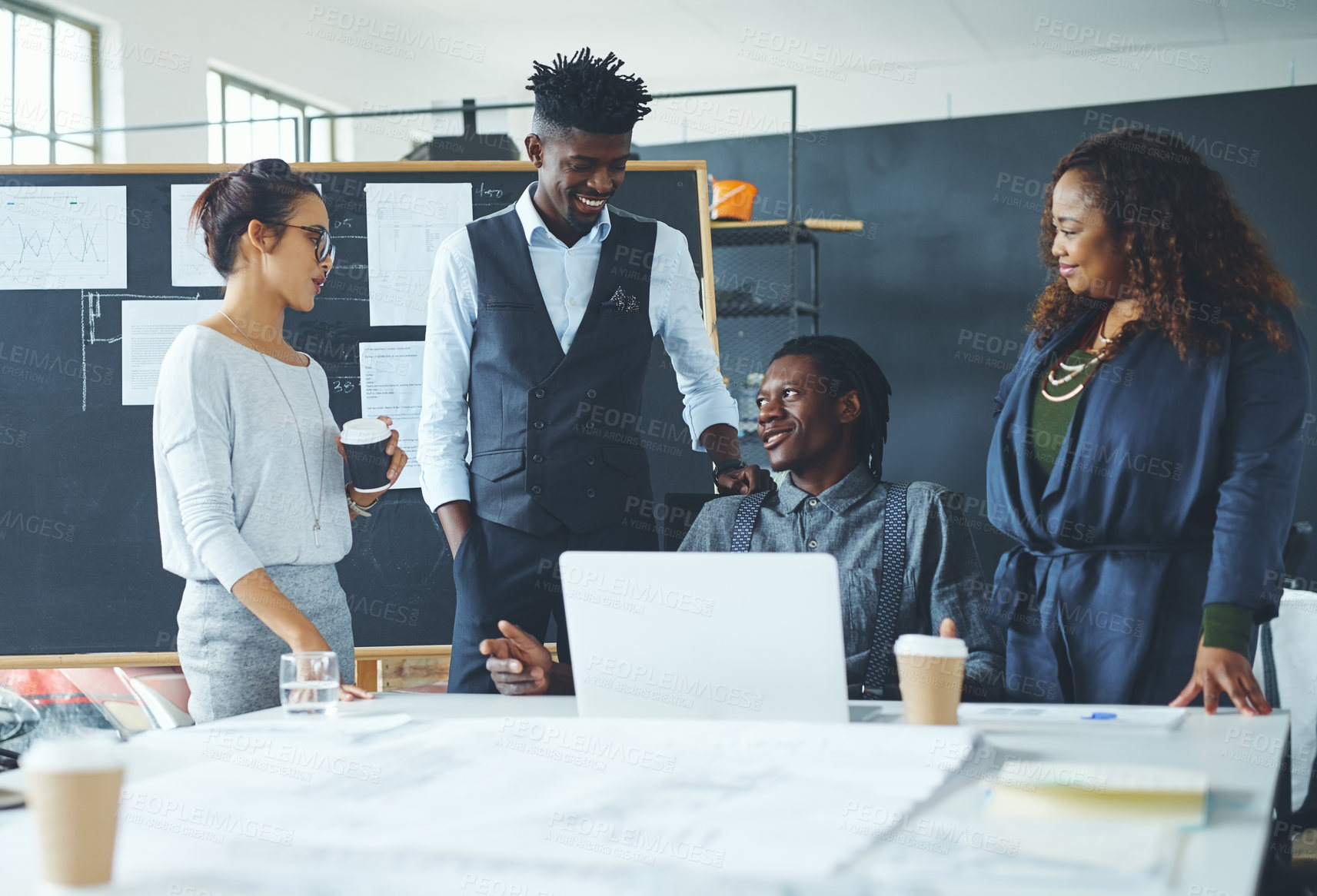 Buy stock photo Cropped shot of a group of creative businesspeople meeting in their office