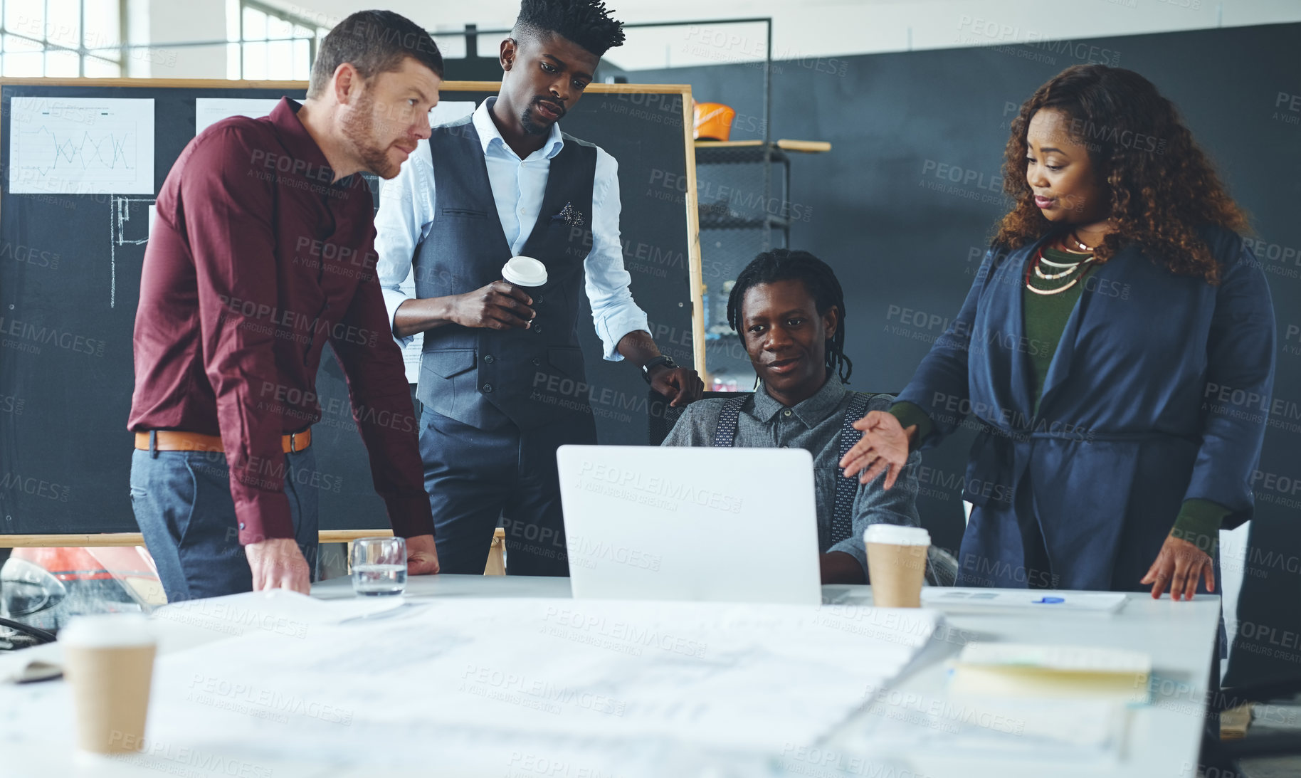 Buy stock photo Cropped shot of a group of creative businesspeople meeting in their office