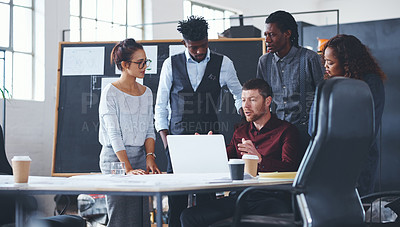 Buy stock photo Cropped shot of a group of creative businesspeople meeting in their office