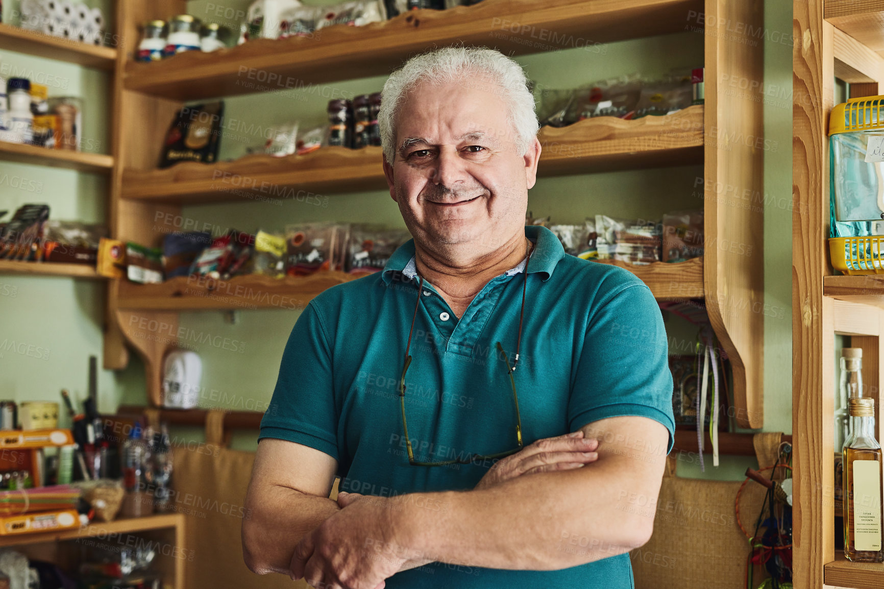 Buy stock photo Shot of a senior man working in a store