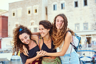 Buy stock photo Travel, friends and women hug in city to explore for holiday, vacation and adventure together. Happy, fashion and people laughing, embrace and smile for journey, relax and tourism in Barcelona