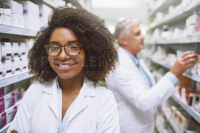 Buy stock photo Black woman, smile and pharmacist portrait in pharmacy with confidence for medical and healthcare job. Wellness, professional and pills dispensary with worker and shelf packing for inventory check