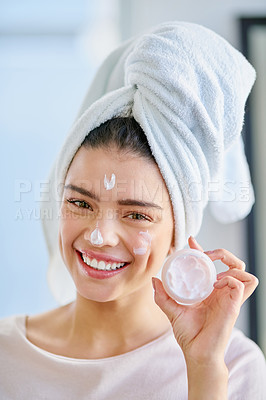 Buy stock photo Cropped shot of a beautiful young woman grooming herself at home