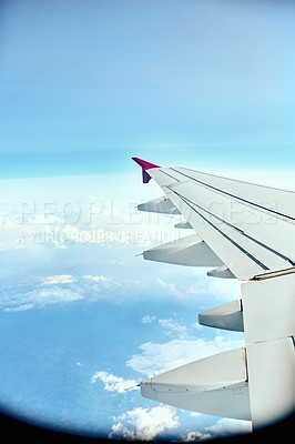 Buy stock photo Shot of an aeroplanes wing while flying